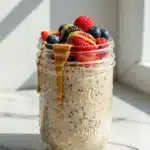 a mason jar filled with classic vanilla high-protein overnight oats